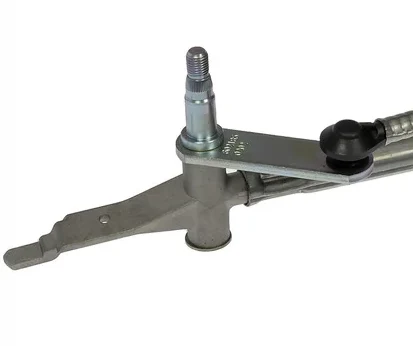 Passenger-side wiper pivot showing the bare Z-shaped mounting tang before the rubber grommet is installed